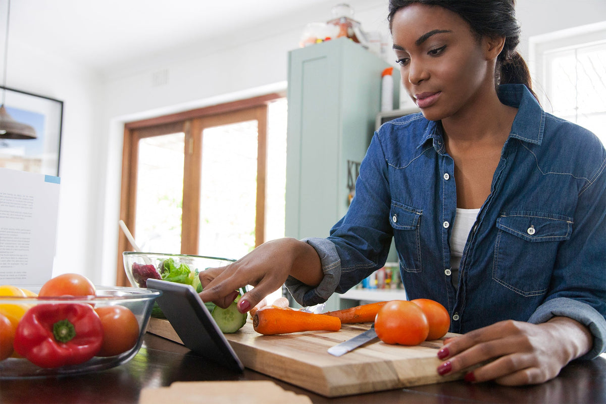 woman reading recipe