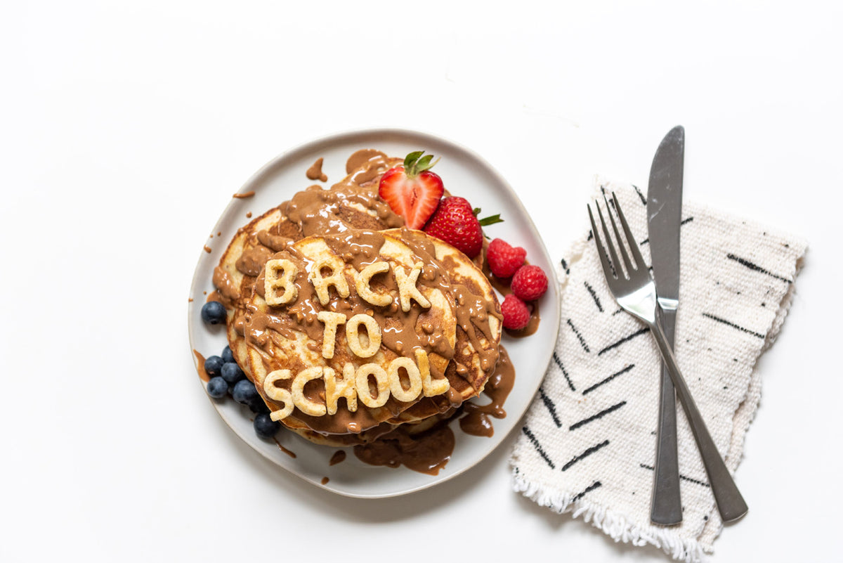 a stack of pancakes that say "Back To School" on top