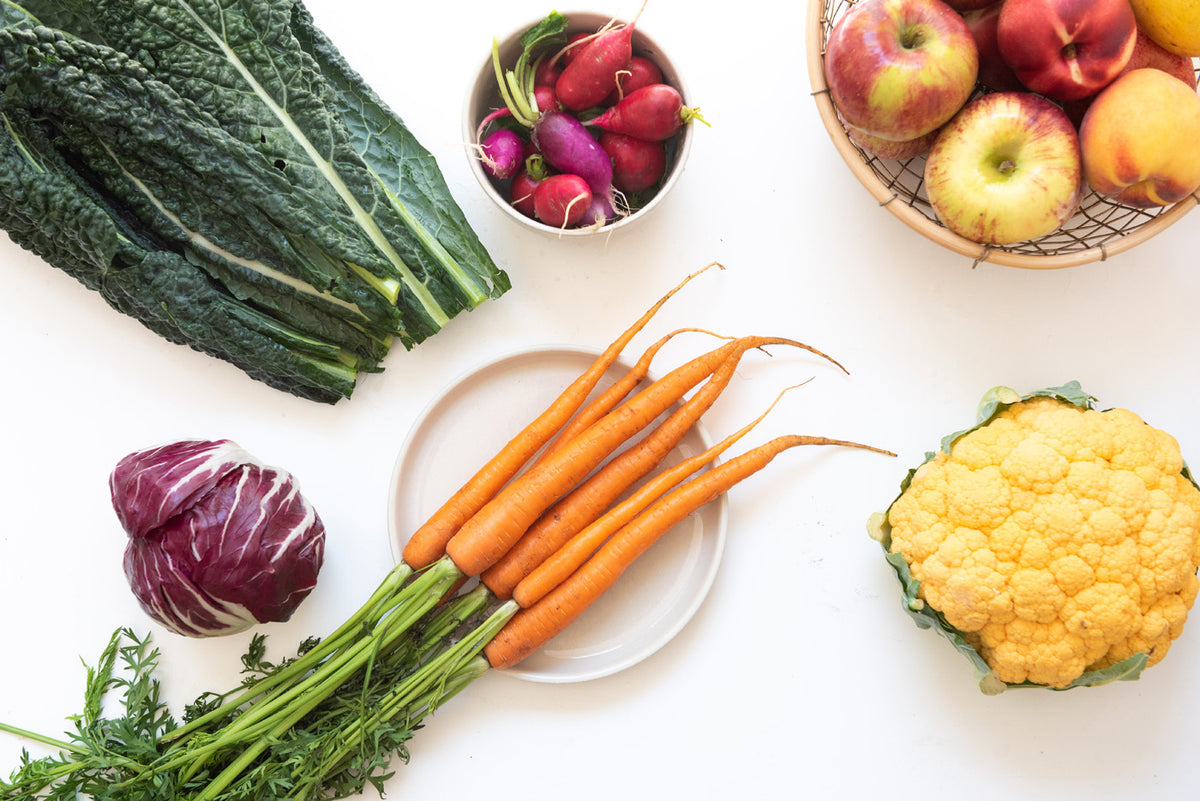 Fresh vegetables on a kitchen counter.